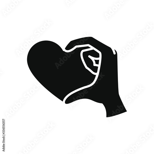 charity and donation concept, hand with heart icon, silhouette style