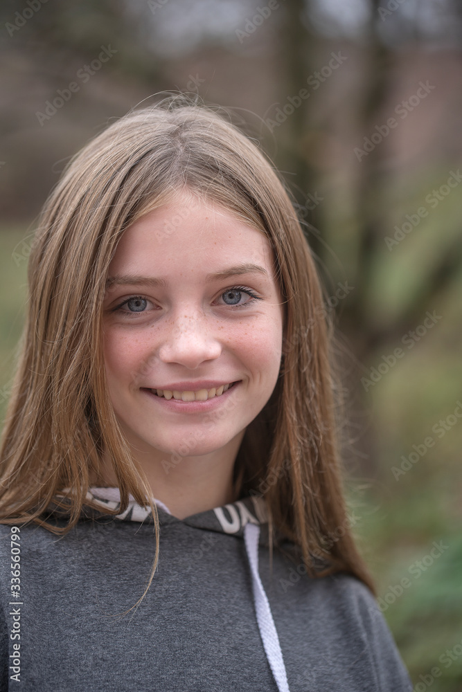 Portrait of a beautiful girl in nature, closeup Portrait of a beautiful girl in nature, closeup
