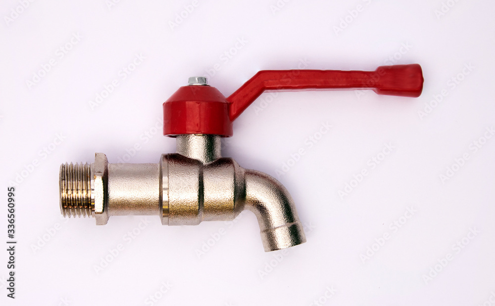 closeup water tap, red handle