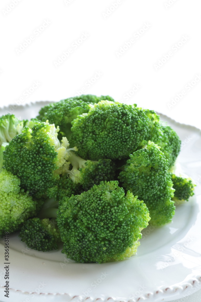 Boiled broccoli on dish with copy space Boiled broccoli on dish with copy space