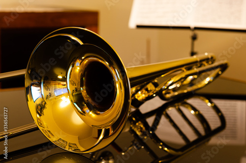 closeup of tenor trombone on the table