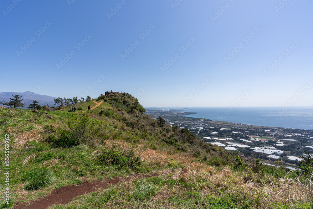 On the Jeju Oreum with a view of the sea On the Jeju Oreum with a view of the sea