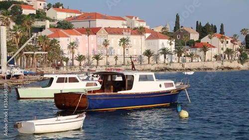 Motorboats anchored near Korcula old town in Croatia. Korcula is a historic fortified town on the protected east coast of the island of Korcula