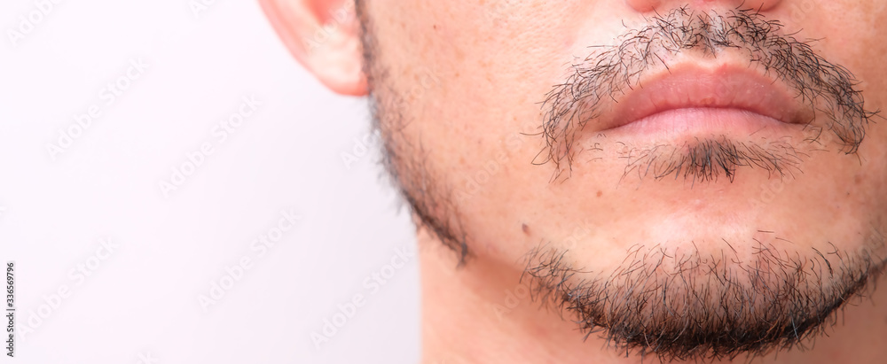 Naklejka premium close up mustache on white background