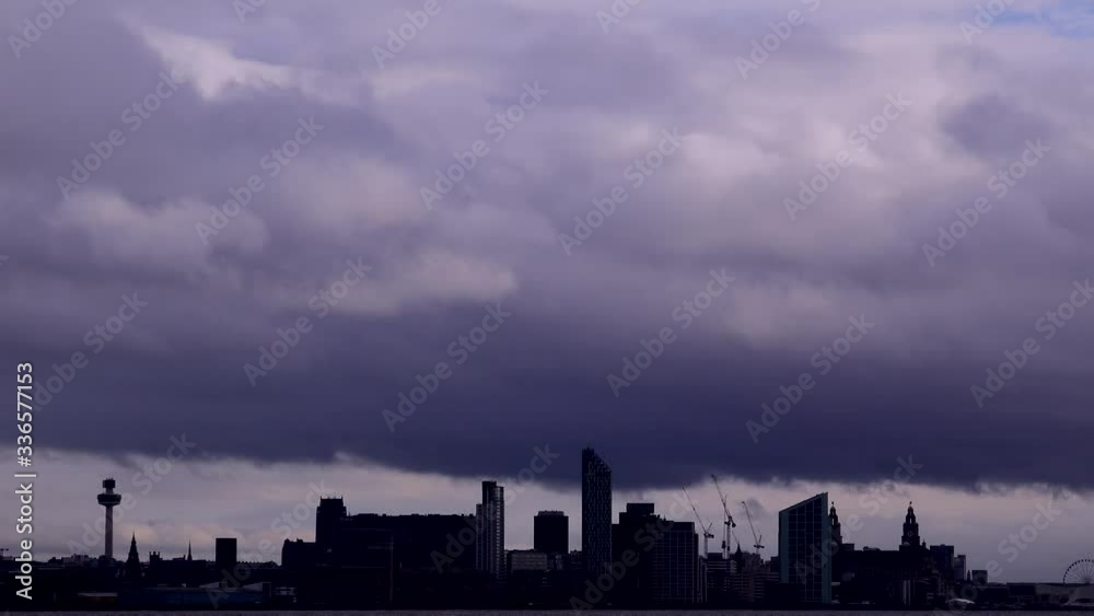 Dark clouds over Liverpool city panoramic shot England UK Dark clouds over Liverpool city panoramic shot England UK