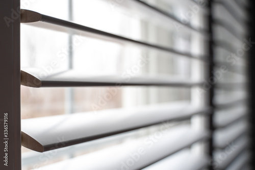 close up of an open window with shutters  photo