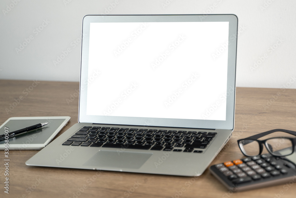 Laptop with blank screen on table. Workspace background new project on laptop computer with blank copy space screen for your advertising text message Laptop with blank screen on table. Workspace background new project on laptop computer with blank copy space screen for your advertising text message