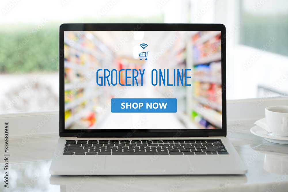 Grocery online shop to order food delivery from supermarket, Shopping grocery store online on laptop computerscreen, electronic marketing, e commerce business concept Grocery online shop to order food delivery from supermarket, Shopping grocery store online on laptop computerscreen, electronic marketing, e commerce business concept