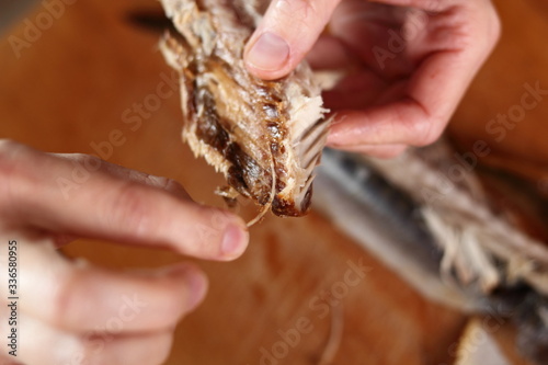 Removing skin and bones from smoked mackerel