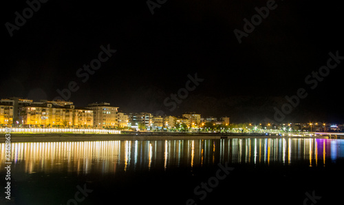 Nght river in Antalya Konyalti and the town line at night time