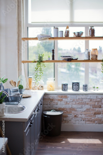 Light kitchen interior with wooden details photo