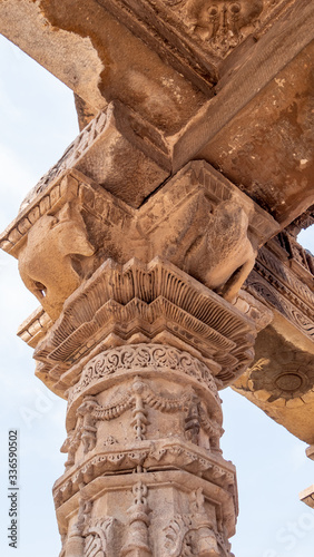 top of a column at qutub minar complex ruins in delhi photo