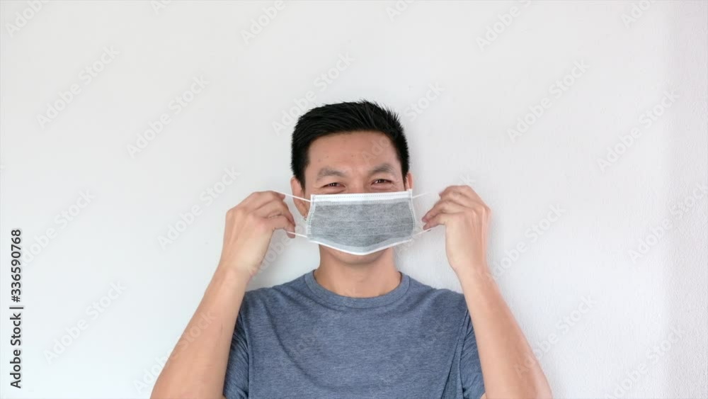 Portrait of a young man wearing protective mask health and safety virus protection concept Portrait of a young man wearing protective mask health and safety virus protection concept
