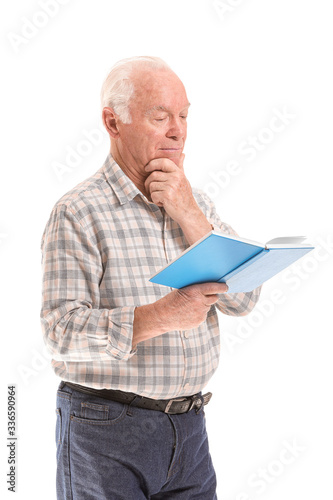 Portrait of elderly man rea...