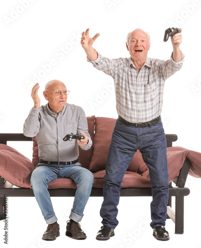 Portrait of elderly men pla...