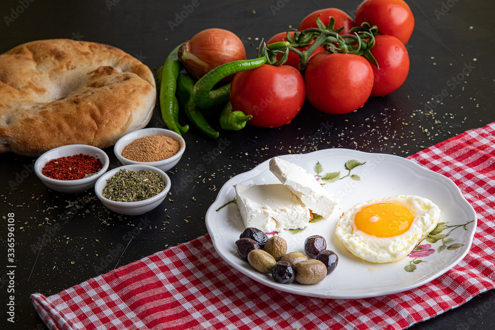 Prepared vegetables and breakfast plate on black background Prepared vegetables and breakfast plate on black background