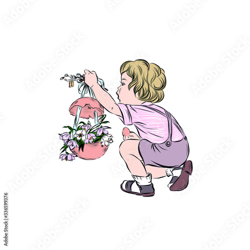 Boy holds easter egg with flowers. 