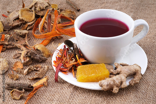 Wedang uwuh is an traditional herbal drink from Java Indonesia, the corona virus antidote. on jute with space for copy