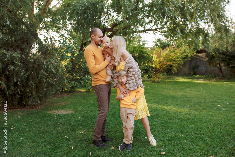 family in nature, summer or autumn, green grass trees in green leaves, a pond in nature, mom blonde in a yellow dress, dad, husband, older son and youngest son, two children, a large and happy family
family in nature, summer or autumn, green grass trees in green leaves, a pond in nature, mom blonde in a yellow dress, dad, husband, older son and youngest son, two children, a large and happy family