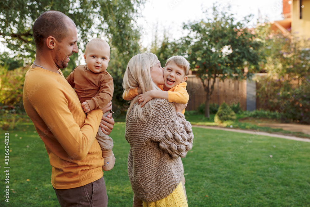 family in nature, summer or autumn, green grass trees in green leaves, a pond in nature, mom blonde in a yellow dress, dad, husband, older son and youngest son, two children, a large and happy family
family in nature, summer or autumn, green grass trees in green leaves, a pond in nature, mom blonde in a yellow dress, dad, husband, older son and youngest son, two children, a large and happy family