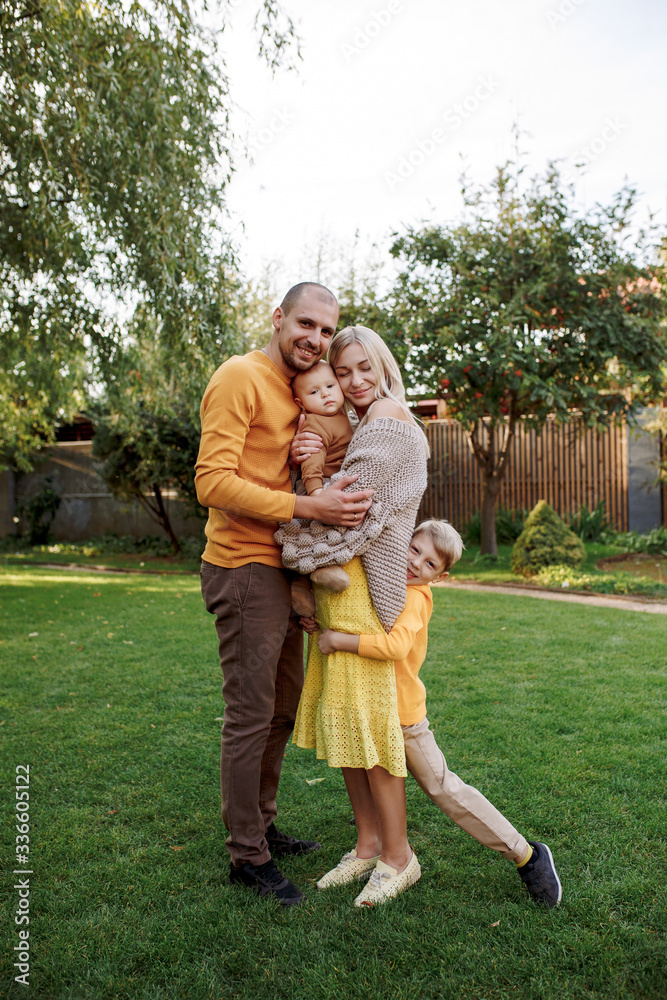 family in nature, summer or autumn, green grass trees in green leaves, a pond in nature, mom blonde in a yellow dress, dad, husband, older son and youngest son, two children, a large and happy family
family in nature, summer or autumn, green grass trees in green leaves, a pond in nature, mom blonde in a yellow dress, dad, husband, older son and youngest son, two children, a large and happy family