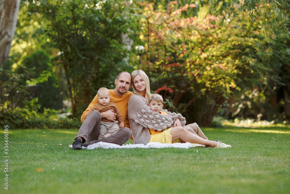 family in nature, summer or autumn, green grass trees in green leaves, a pond in nature, mom blonde in a yellow dress, dad, husband, older son and youngest son, two children, a large and happy family
family in nature, summer or autumn, green grass trees in green leaves, a pond in nature, mom blonde in a yellow dress, dad, husband, older son and youngest son, two children, a large and happy family