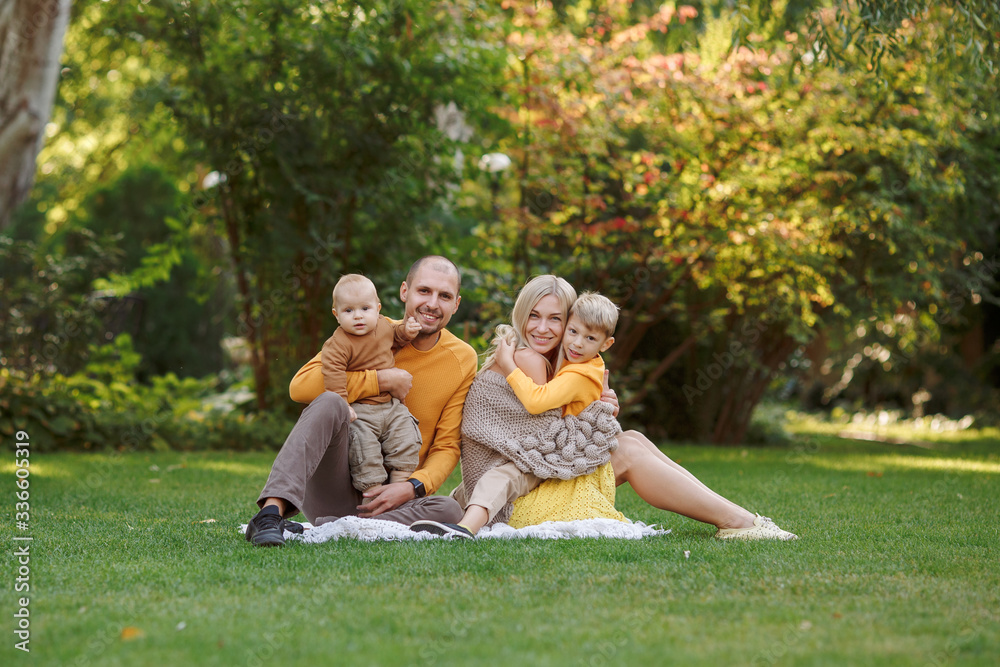 family in nature, summer or autumn, green grass trees in green leaves, a pond in nature, mom blonde in a yellow dress, dad, husband, older son and youngest son, two children, a large and happy family
family in nature, summer or autumn, green grass trees in green leaves, a pond in nature, mom blonde in a yellow dress, dad, husband, older son and youngest son, two children, a large and happy family