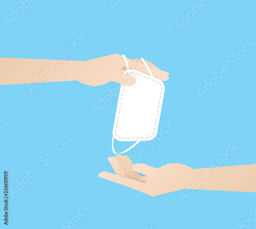 hand holding white mask give for other.protect. personal hygiene,healthcare, disease protection, coronavirus,covid-19