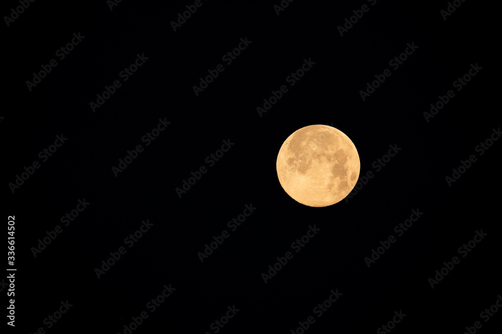 Big yellow moon in the dark sky Big yellow moon in the dark sky