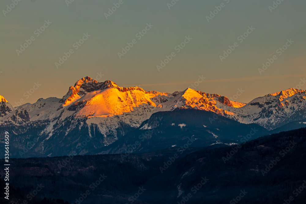 Mount Triglav sunlit from Bohinj valley