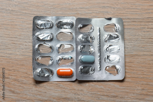 Empty blister packs of medicines. The lack of medicines for the treatment of viral diseases. The concept of expensive medicines and the lack of money to buy them.