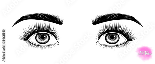 Fashion illustration. Black and white hand-drawn image of eyes with eyebrows and long eyelashes looking up. Vector EPS 10.