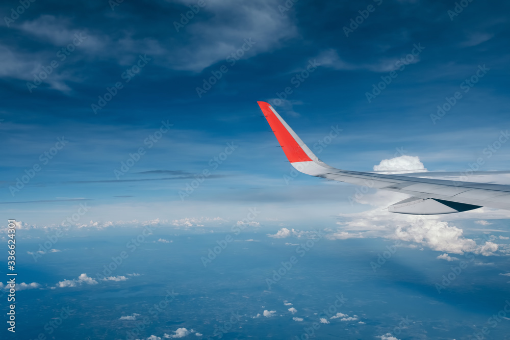 Fototapeta premium red winglet in graduated dark blue sky