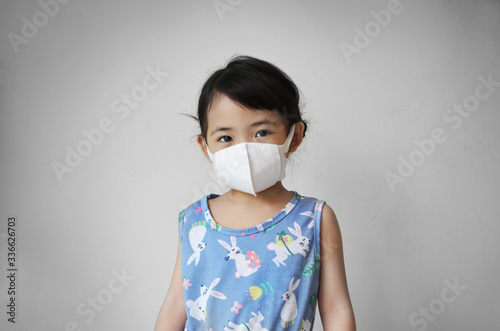 young girl using face mask for prevention from corona virus