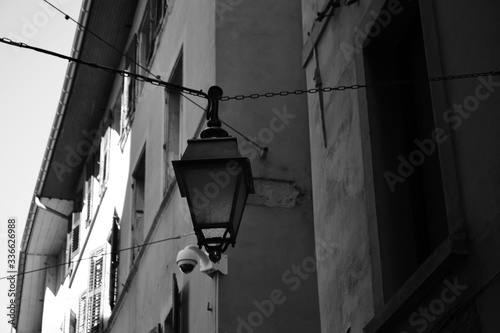 Chambéry, France - August 11th 2017 : old street lantern hanging.