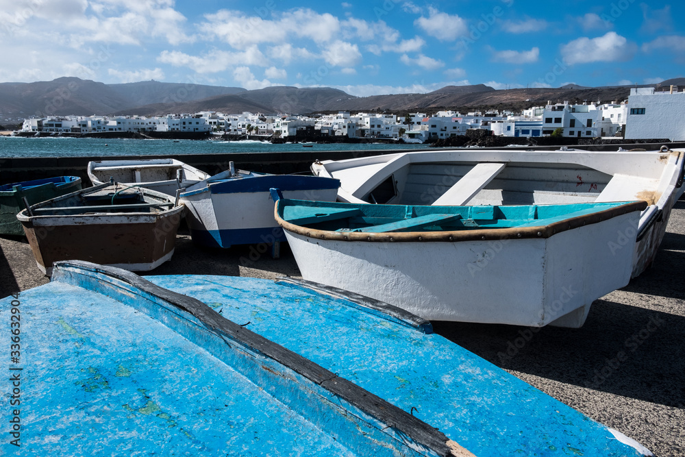 Beautiful mediterranean landscape with wooden boats at Canary Island, Spain