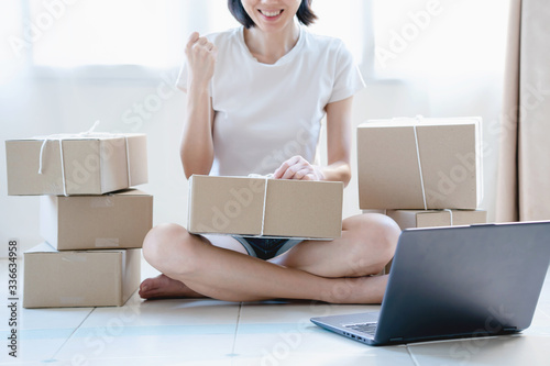 Young woman freelancer working sme business online shopping