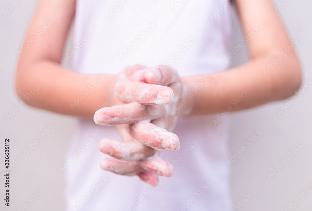 Child's hands washing their hands. Personal hygiene, cleansing the hands.
Child's hands washing their hands. Personal hygiene, cleansing the hands.