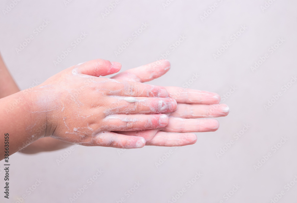 Fototapeta premium Child's hands washing their hands. Personal hygiene, cleansing the hands.
