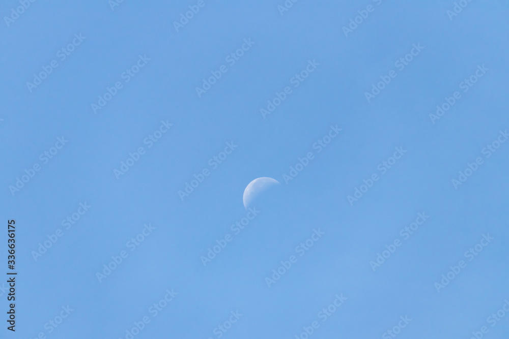 Crescent moon on blue sky. Crescent moon on blue sky.