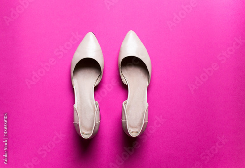 pointy shoes on colorful background. free copy space. Overhead shot of elegant shoes of pastel color. Top view. Summer, fashion.