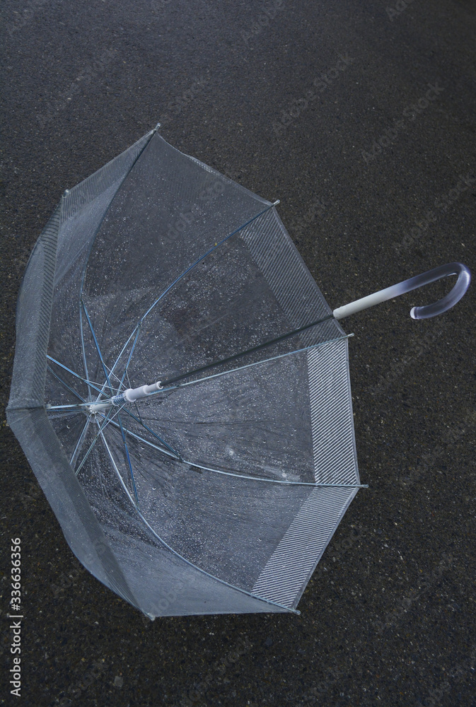 Αυτοκόλλητο raindrops look beautiful on the surface of a transparent umbrella