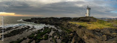 Panorama of the coast with a lighthouse