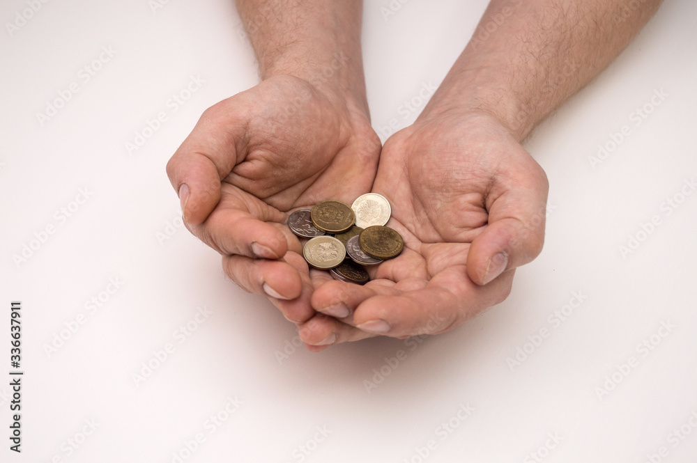 Poor man's hands with russian coins, poverty concept Poor man's hands with russian coins, poverty concept