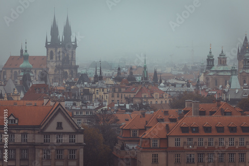 Rooftop foggy view of Prague historical center, Czech Republic