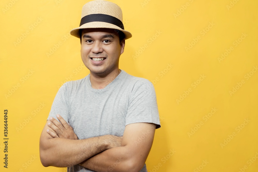 Handsome men in a good mood, bright yellow background room