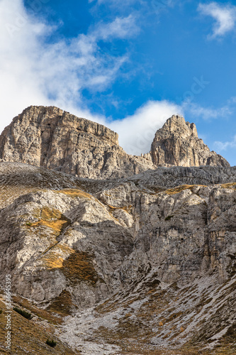 Rocky mountains in Italy with cloudy sky, Dolomites, Tre Cime di Lavaredo