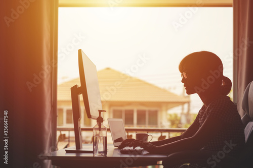 Young Women is working from home during Coronavirus photo