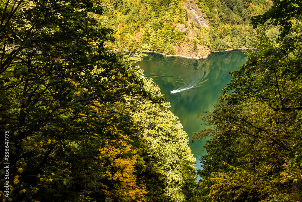 heart-shaped lake in the mountains