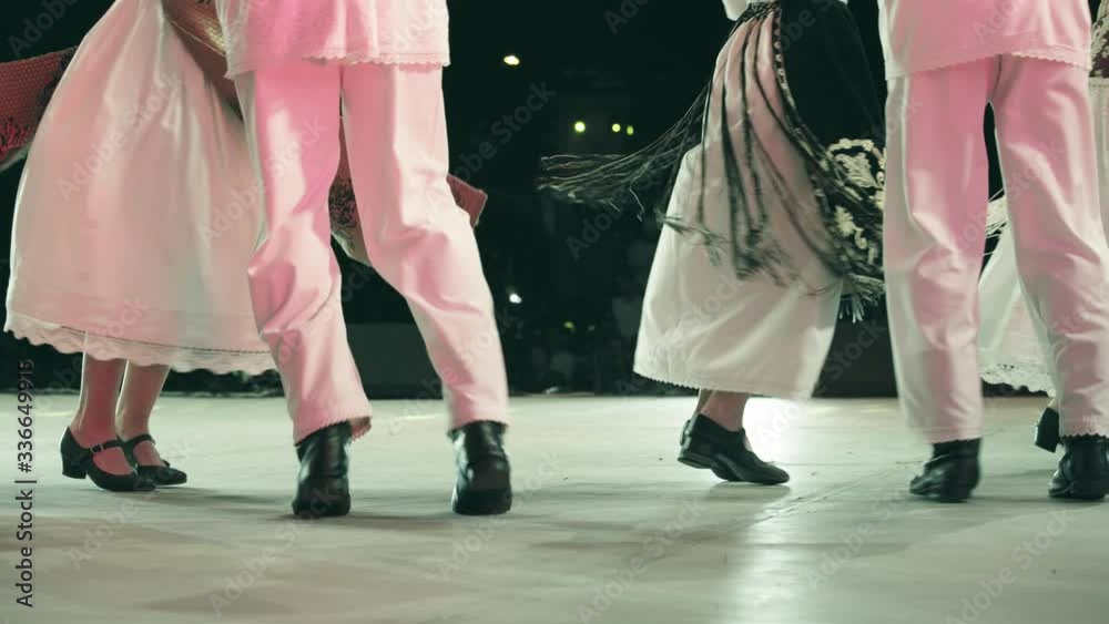 Traditional romanian folklore dancers in traditional costumes dancing ...